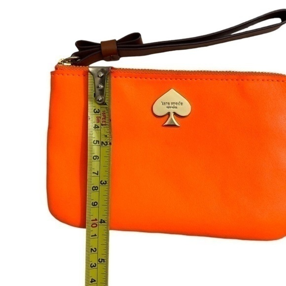 Kate spade orange wristlet bag